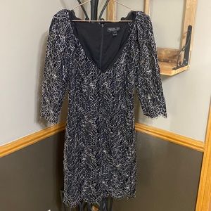 Rachel Zoe black v neck 3/4 sleeve dress with metallic floral overlay size 6